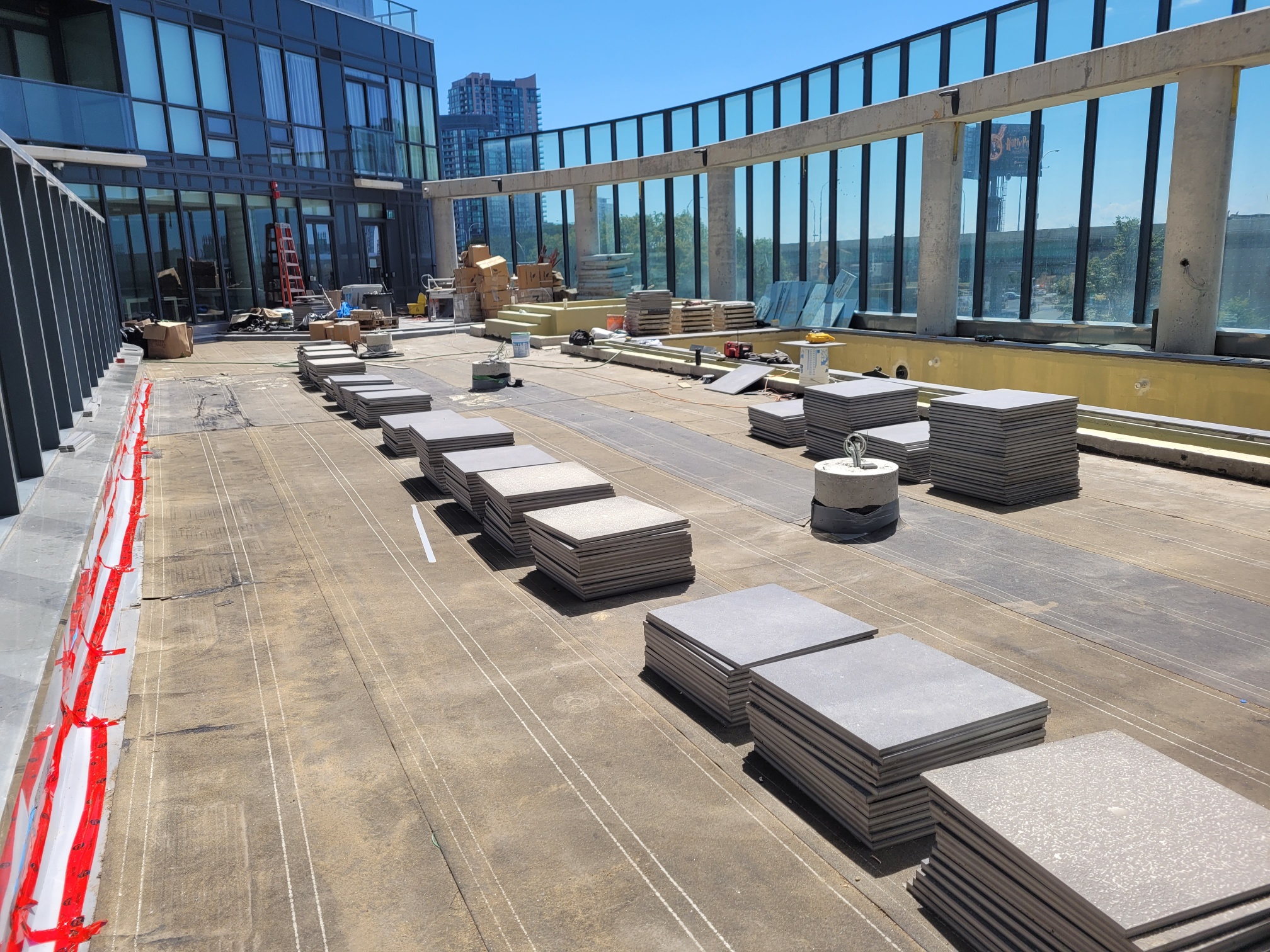 Infinity Pool Deck using PAVE-EL Pedestals by Envirospec for Liberty Central by the Lake condos