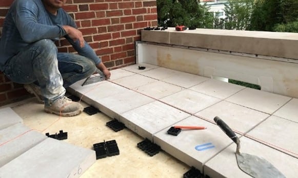 Condo balcony that used PAVE-EL Paver Pedestals.