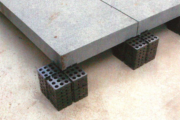 PAVE-EL Pedestals stacked to create limited height adjustment.