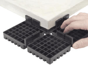 PAVE-EL Pedestals by Envirospec at corner of stone paver